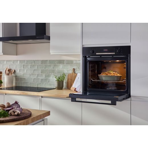 Bosch Series 4 HQA534BB3B Built In Electric Single Oven - Black - oven door open in kitchen shot