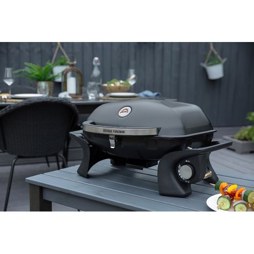 George Foreman Portable Gas Barbeque - Black - BBQ on table outside shot