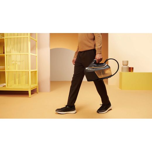 Philips PerfectCare 6000 Series Pressurised Steam Generator Iron - Gold / Black - Iron in use