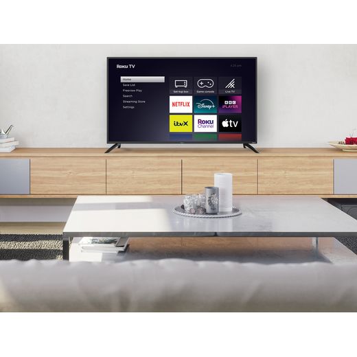 UX230 4K Ultra HD Smart Roku TV - Tv in living room shot 