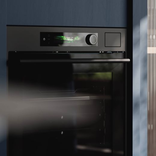ASKO Craft Pyrolytic OTP66BSH Wifi Connected Built In Electric Single Oven - Black Steel - close up oven in kitchen shot