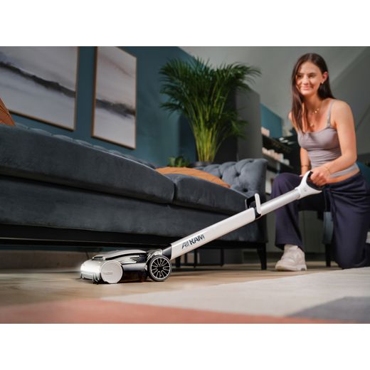 Gtech AirRAM 3 1-03-270 Cordless Vacuum Cleaner with up to 30 Minutes Run Time - White - Woman hoovering in sofa shot