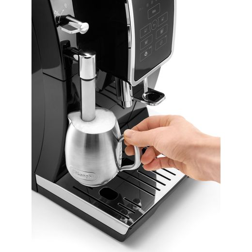 De'Longhi Dinamica ECAM350.15.B Bean to Cup Coffee Machine - Black - person using milk frother