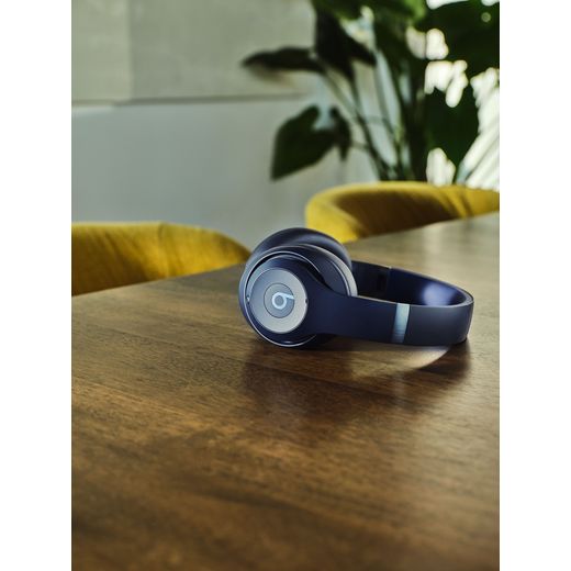 Beats Headphones - Navy - Headphones on table
