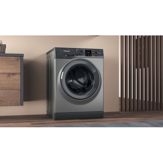Hotpoint Anti-Stain NSWM 846 GG UK 8kg Washing Machine with 1400 rpm - Graphite - Washing machine in room shot