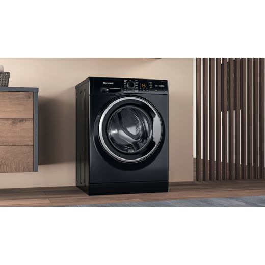 Hotpoint Anti-Stain NSWM 846 BS UK 8kg Washing Machine with 1400 rpm - Black - Washing machine in room shot