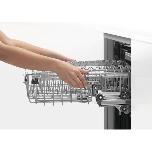 Fisher & Paykel Series 7 Fully Integrated Standard Dishwasher - Black with Fixed Door Hinge Kit - Person using rack