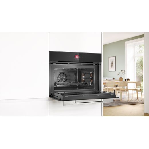 Bosch Compact Electric Single Oven - Black - Oven in kitchen with door open shot