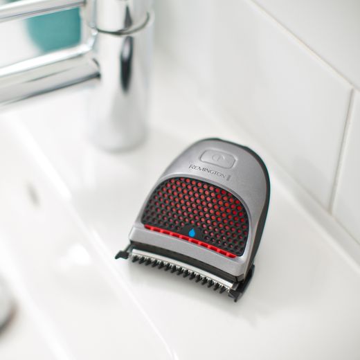 Remington Quick Cut HC4250 Hair Clipper Black / Silver - Clipper on bathroom surface