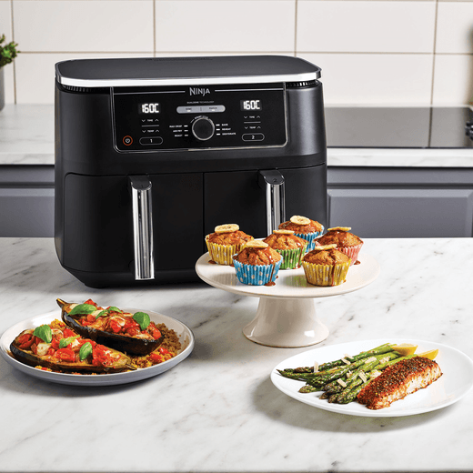 Ninja Foodi Max Dual Zone AF400UK Air Fryer - Black - Ninja in kitchen with food round shot