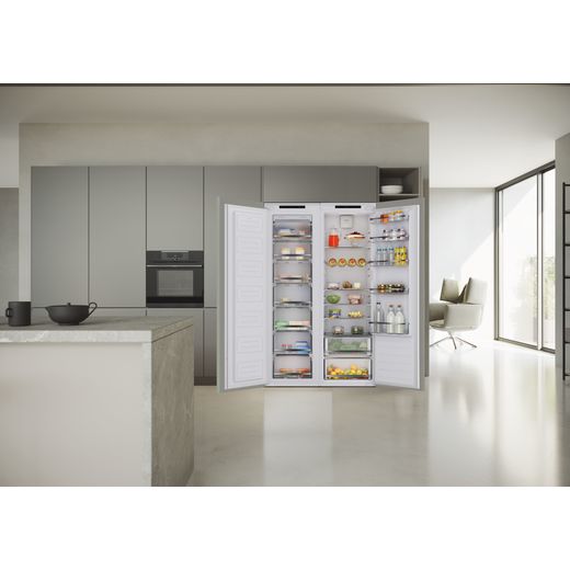 Haier Integrated Frost Free Upright Freezer - Freezer in kitchen next to fridge shot