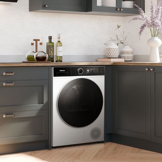 Hisense 5i Series DH5I104BWAB Wifi Connected 10Kg Heat Pump Tumble Dryer - White - Washing machine in kitchen shot
