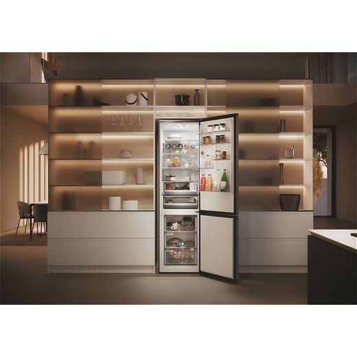 Haier 70/30 Total No Frost Fridge Freezer - Silver - Fridge freezer with door open in kitchen shot