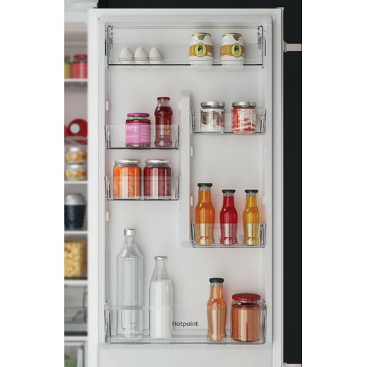 Hotpoint Integrated 70/30 Total No Frost Fridge Freezer - White - Close up door shelf shot