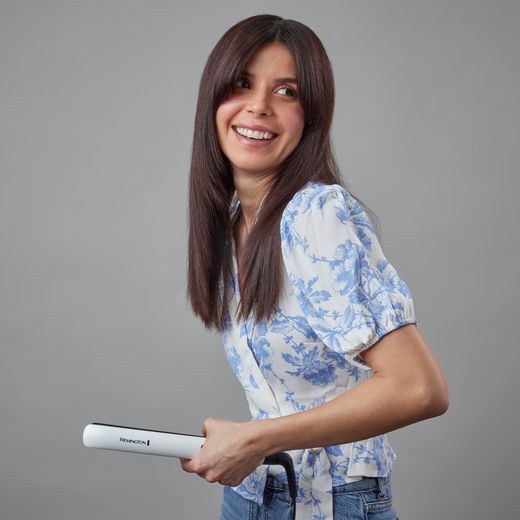 Remington S8500 Hair Straighteners - White / Blue - Woman holding straighteners