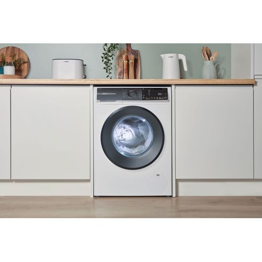 Bosch Series 6 i-Dos WGH254A0GB 10kg WiFi Connected Washing Machine with 1400 rpm - White - machine in kitchen shot