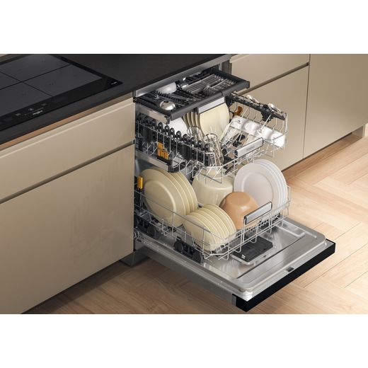 Whirlpool Standard Dishwasher - Stainless Steel - Dishwasher in kitchen with door open and racks out