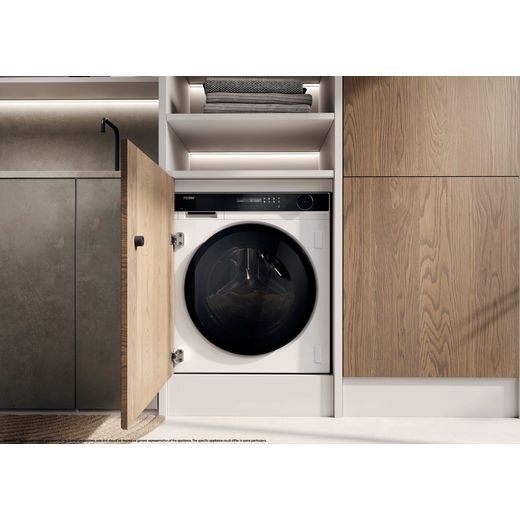 Haier Series 8 HWB100B14858U1UK Integrated 10kg Washing Machine with 1400 rpm - White - Washing machine in utility room shot