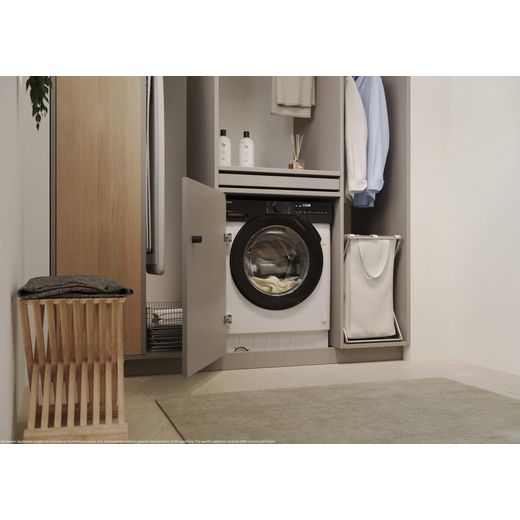 Haier Series 6 BHA6SD696M6DB980 Wifi Connected Integrated 9Kg / 6Kg Washer Dryer with 1600 rpm - White - Washing machine in utility room shot 