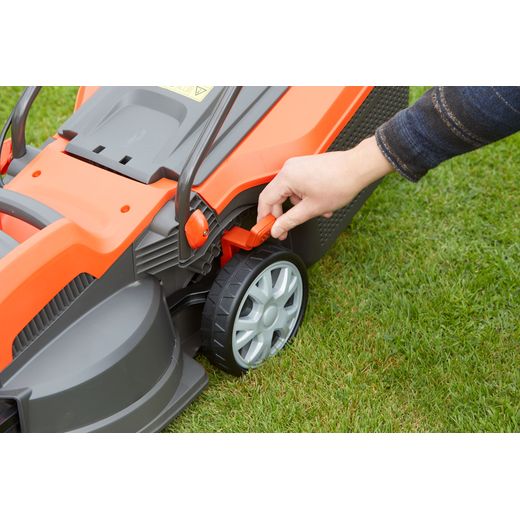 Flymo Speedi-Mo 360C Corded Lawn Mower - Orange - person changing height shot