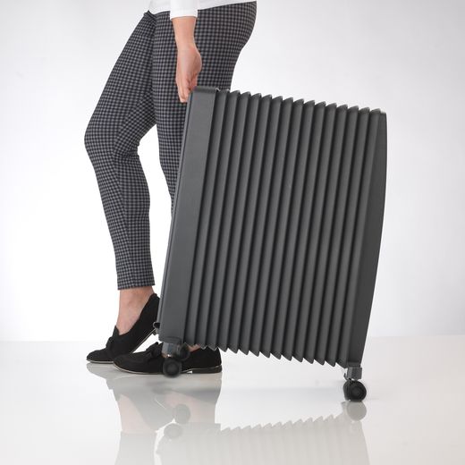 Dimplex EvoRad Eco Oil Free Radiator 2000W - Anthracite - Person carrying radiator shot