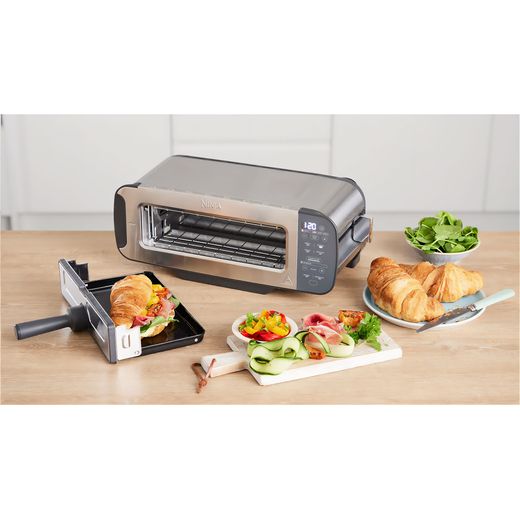 Ninja Foodi 3-in-1 Toaster, Grill & Panini Press ST202UK 2 Slice Toaster - Silver - Grill on worktop with prepared food