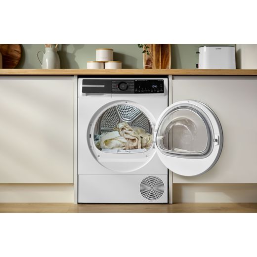 Bosch Series 6 WQH246D9GB 9Kg Heat Pump Tumble Dryer - White - machine with door open shot