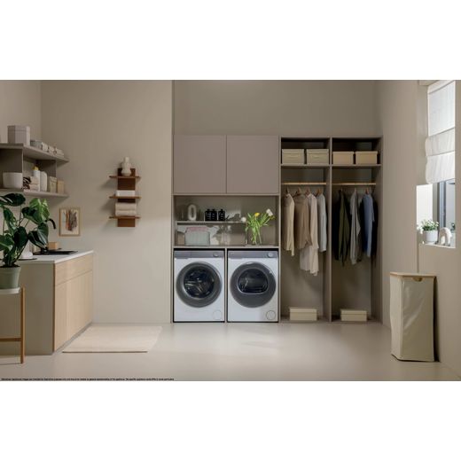 Haier X7 HW120-B14367U-UK 12kg Washing Machine with 1400 rpm - White - Washing machine in utility room shot