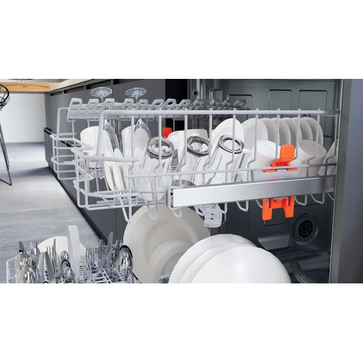 Hotpoint Standard Dishwasher - Stainless Steel  - Dishwasher in kitchen with door open and filled shot 