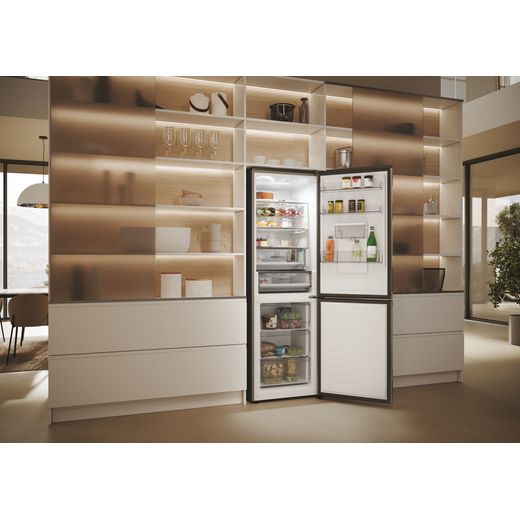 Haier Frost Free Fridge Freezer - Stainless Steel - Fridge freezer in kitchen with door open and stocked shot