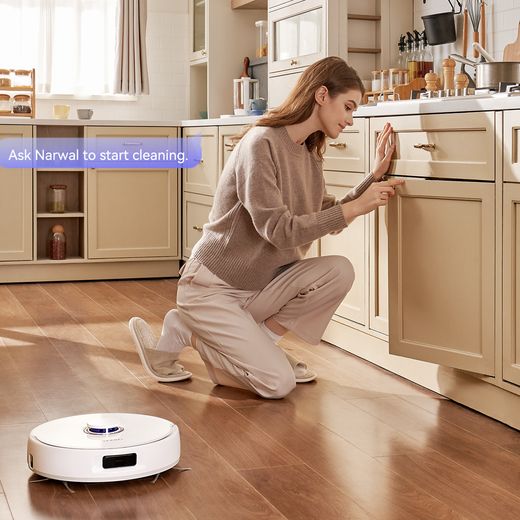 Narwal Freo X Ultra Robotic Vacuum Cleaner - White - Vacuum cleaning kitchen shot 
