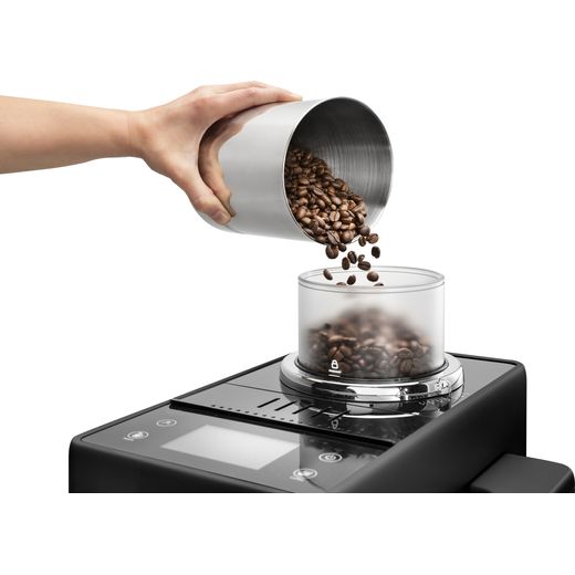 De'Longhi EXAM440.55.B Coffee Machines Black - Person pouring coffee beans into container shot