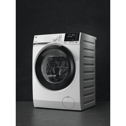 AEG ProSense® Technology 8Kg Washing Machine - White - Washing machine in dark room