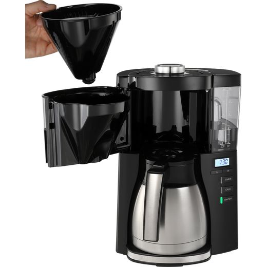 Melitta 6769008 Coffee Machines Black - Person using filter in coffee machine