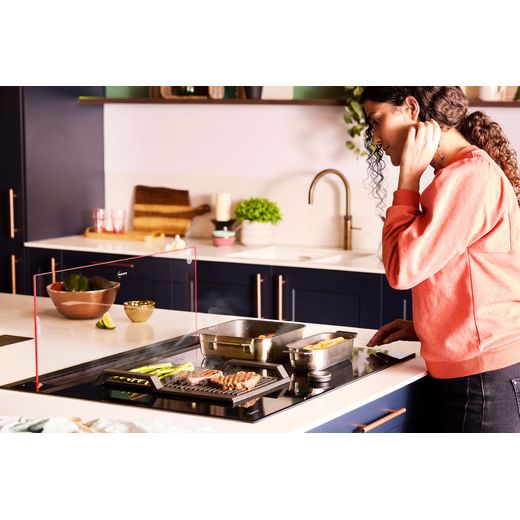 NEFF N90 80 cm Downdraft Cooker Hood - Black - Person cooking food in kitchen shot