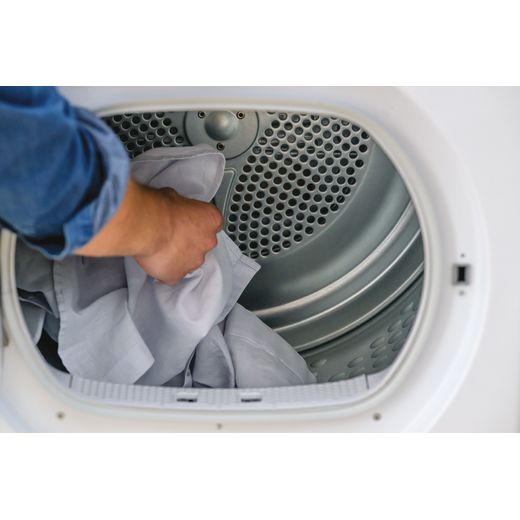 Hoover H-DRY 350 HRE H9N2TBE-80 Wifi Connected 9Kg Heat Pump Tumble Dryer - White - Person using drum shot