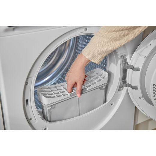 Bosch Series 8 WRB247C9GB 9Kg Heat Pump Tumble Dryer - White - person removing filter shot