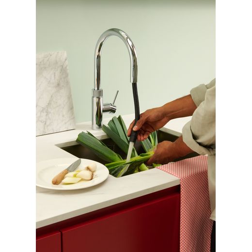 Quooker Tap Flex, Cube and PRO3-EQ B tank - Chrome - Person using flex hose shot