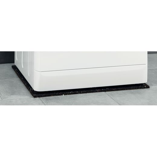 Wpro C00508740 Anti Vibration Mat for Washing Machines - Close up of mat under machine shot