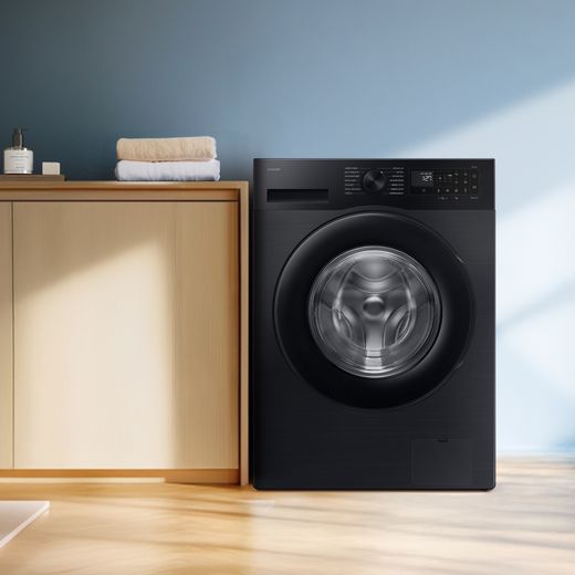 Samsung Series 5 AI Energy SpaceMax™ WW11DG5B25ABEU 11kg WiFi Connected Washing Machine with 1400 rpm - Black - Washing machine in room