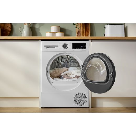 Bosch Series 6 WQG24502GB 9Kg Heat Pump Tumble Dryer - White - machine with door open shot