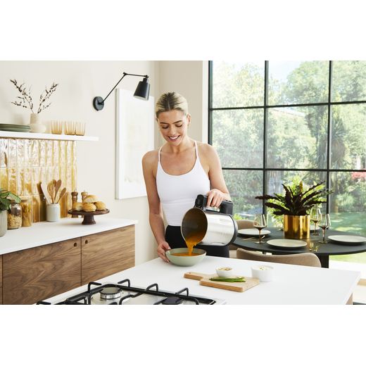 Morphy Richards Sauté and Soup 501014 1.6 Litre Soup Maker - Stainless Steel - Pouring soup into bowl