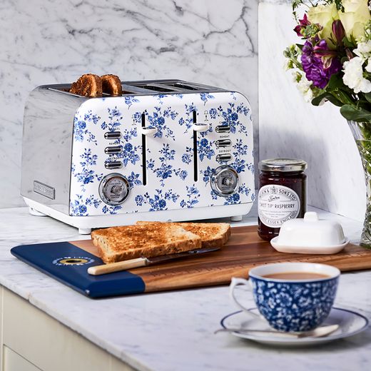 Laura Ashley VQSBT583LACR 4 Slice Toaster - China Rose - Toaster on worktop next to toast and cup of tea