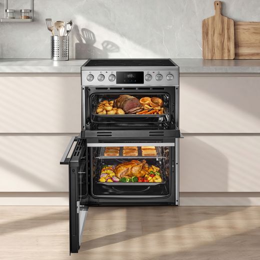 Midea MFO24EME4R118-SS 60cm Wide Double Oven Electric Cooker with Ceramic Hob - Stainless Steel  -  cooker cooking food in kitchen shot