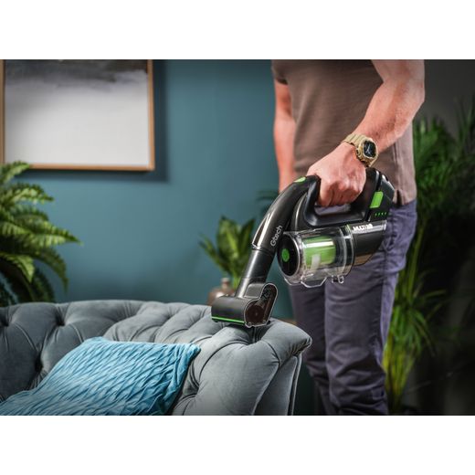 Gtech Multi K9 1-03-195 Cordless Vacuum Cleaner with up to 20 Minutes Run Time - pixel - Man hoovering sofa