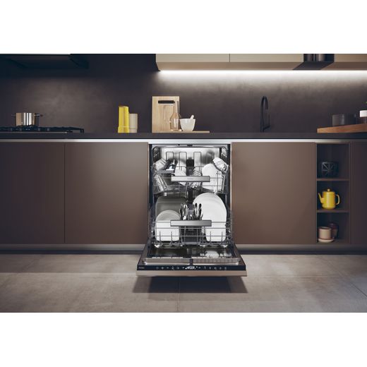Haier Integrated Standard Dishwasher - Black - Dishwasher in kitchen with door open shot