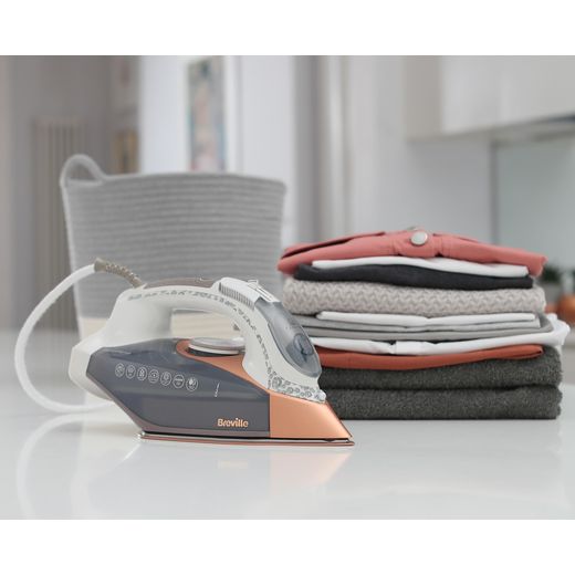 Breville DiamondXpress VIN401 3100 Watt Iron -White / Rose Gold - Iron near clothes shot