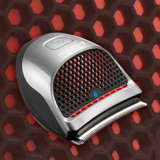 Remington Quick Cut HC4250 Hair Clipper Black / Silver - Clipper on black and red surface