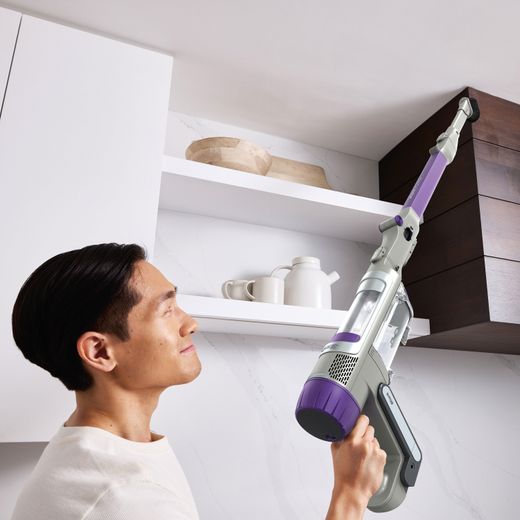 Shark PowerDetect IP1251UKT Cordless Vacuum Cleaner with up to 70 Minutes Run Time - White / Java Grey - Vacuuming top of cupboard