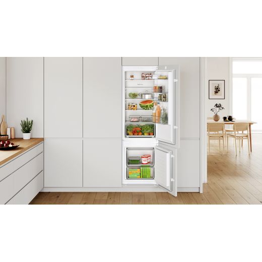Bosch Integrated Fridge Freezer - White - Fridge freezer in cupboard in kitchen shot